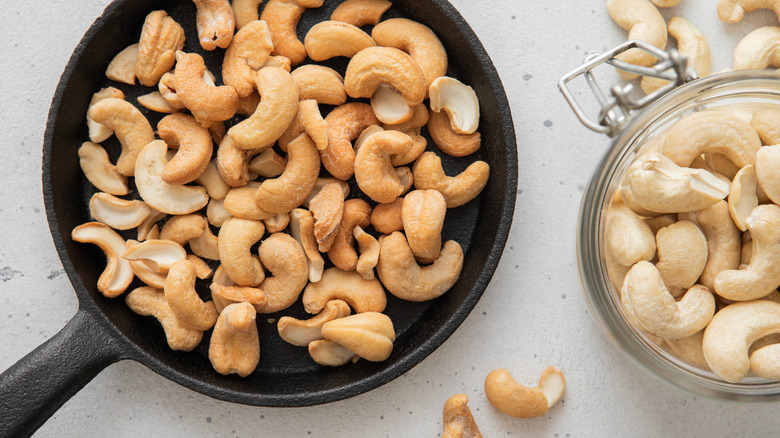 Cashews in pan and bowl