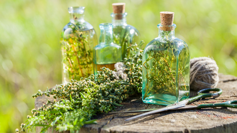 Bottles of herb-infused vinegar