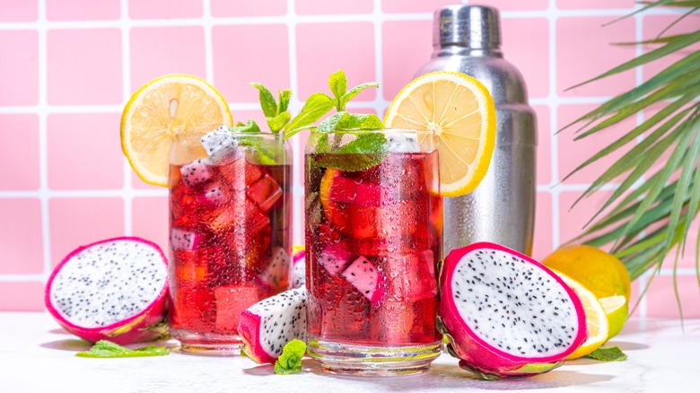 dragon fruit cocktails in glasses with shaker