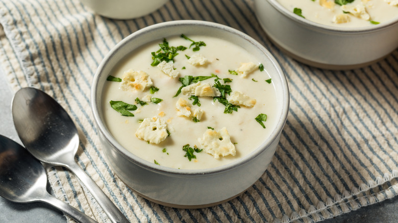 Clam chowder in white bowl