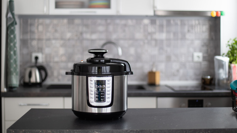 a pressure cooker on a table