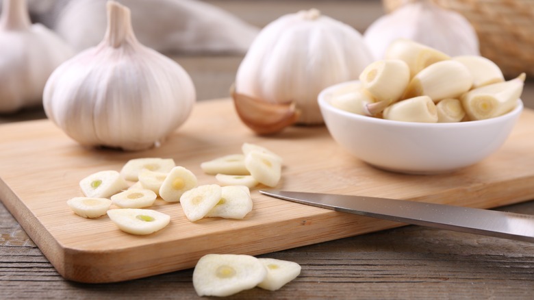 Chopped fresh garlic on cutting board