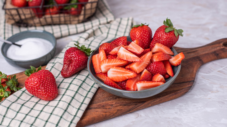 A bowl of sliced strawberries