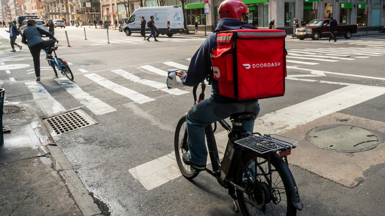 DoorDash delivery person on bike