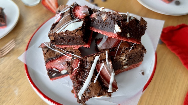 Double decker strawberry brownies on a plate