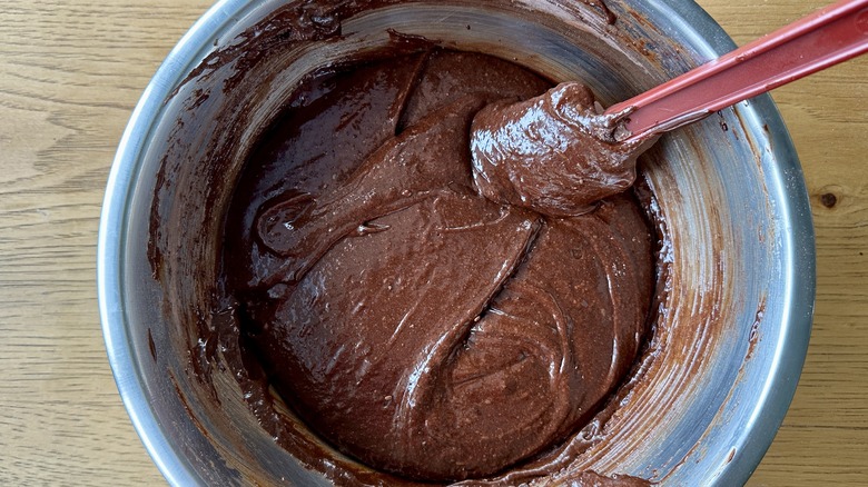 Folding dry ingredients into brownie batter