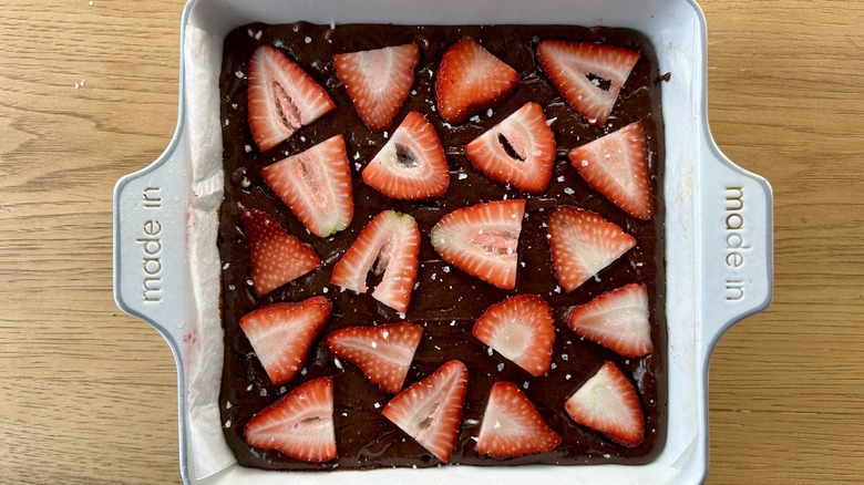 Strawberries over brownie batter