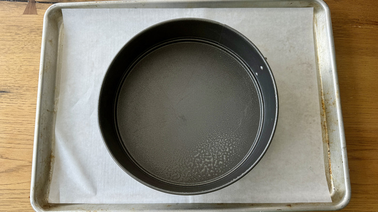 circular baking pan on sheet pan