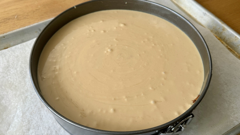 unbaked cheesecake in pan