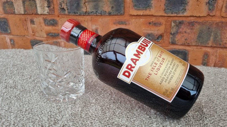 Bottle of Drambuie with glass