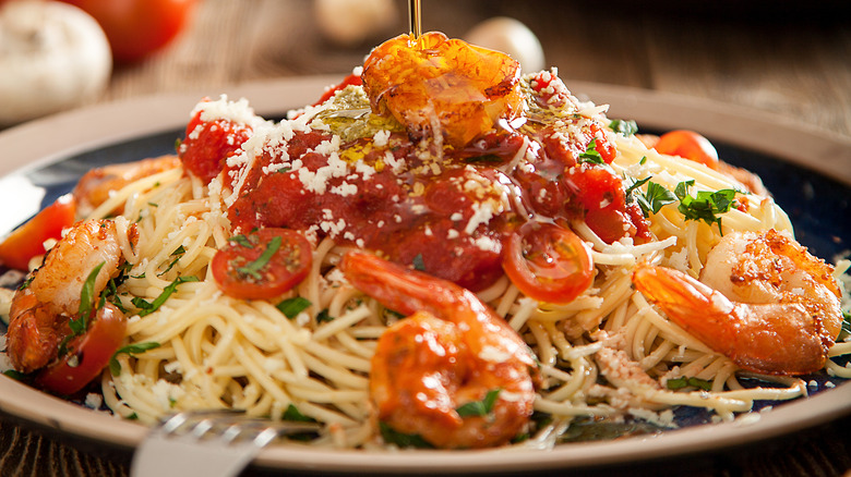 oil drizzled over pasta dish