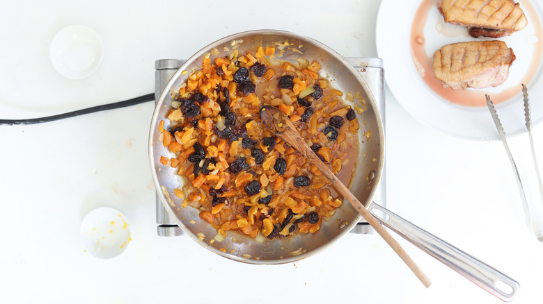 apricot chutney cooking in a pan