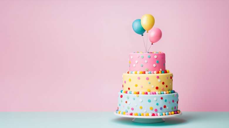 birthday cake with balloons