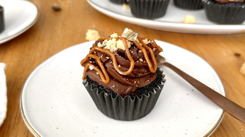 Dulce de leche-stuffed cupcake on a plate