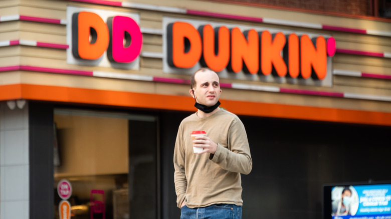 Customer outside of a Dunkin'