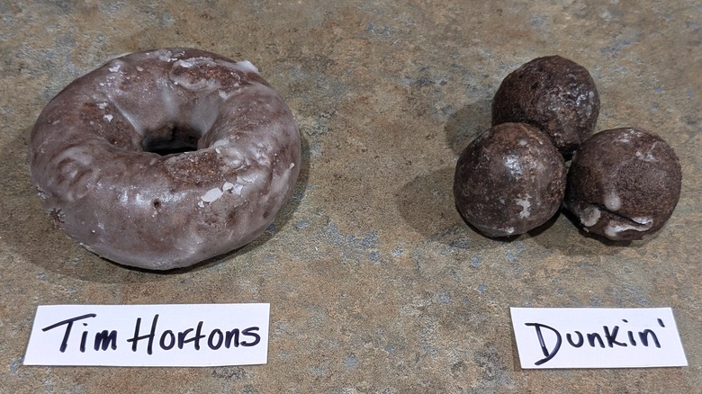 Tim Hortons chocolate glazed donut with Dunkin' chocolate glazed Munchkins