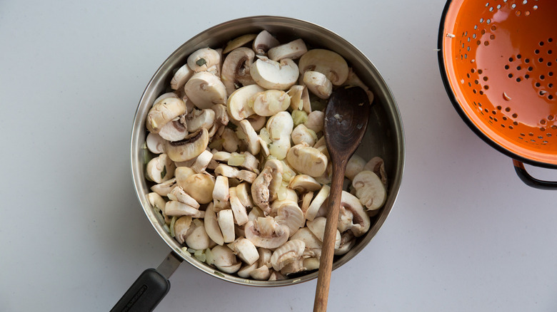 mushrooms cooking in pot