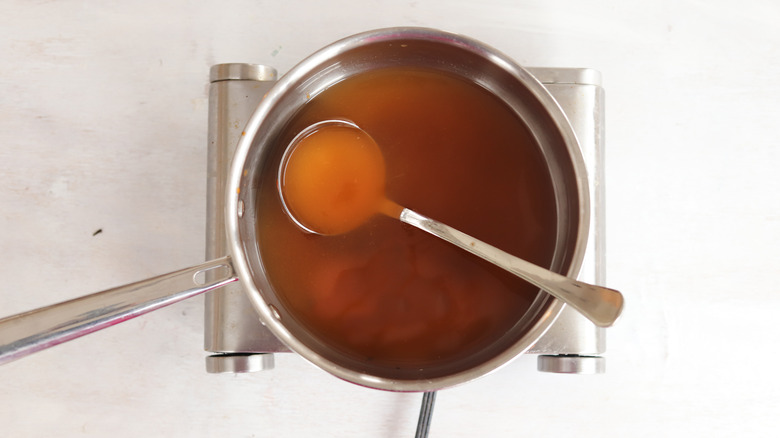 vegetable broth heated in a pan