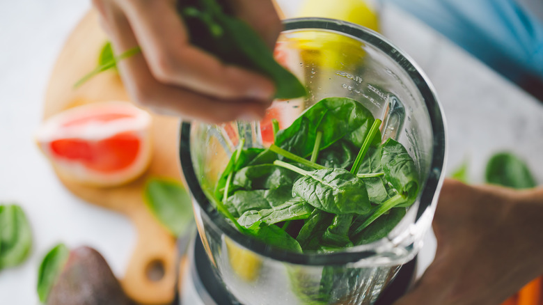 Adding spinach to blender 