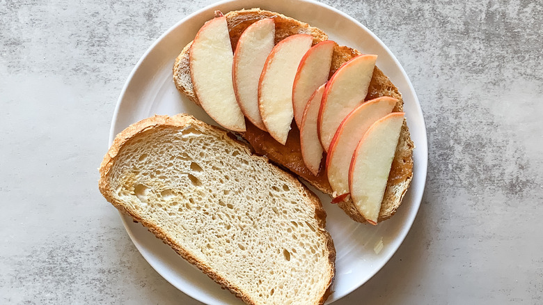 preparing apple grilled cheese sandwich