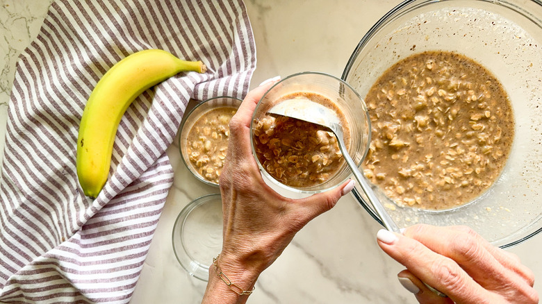 adding oat mixture to jar