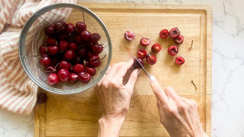 cherries being cut