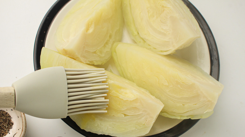 brushing cabbage with butter