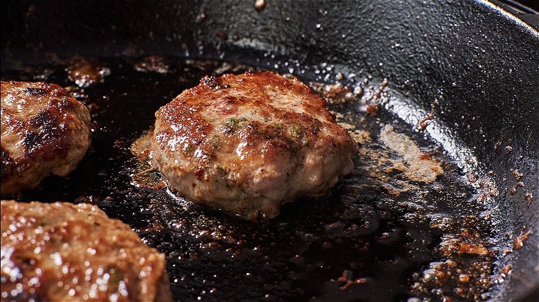 turkey sausage browning in skillet