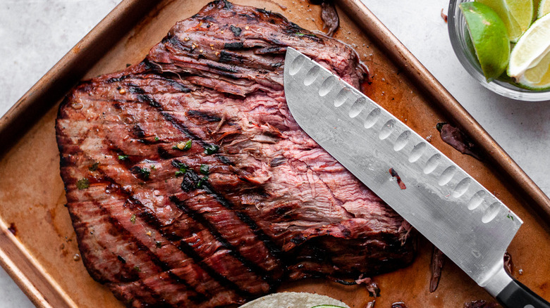 knife on top of steak