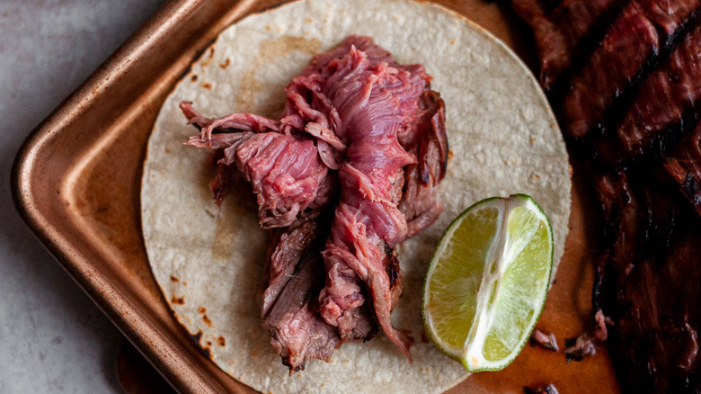 carne asada with knife