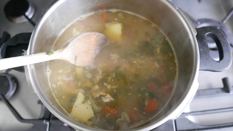 chicken carcass soup in pot