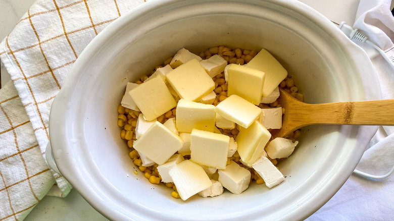 butter, cream cheese, corn in crockpot