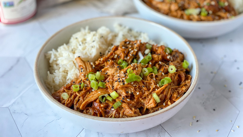 sesame chicken in a bowl 