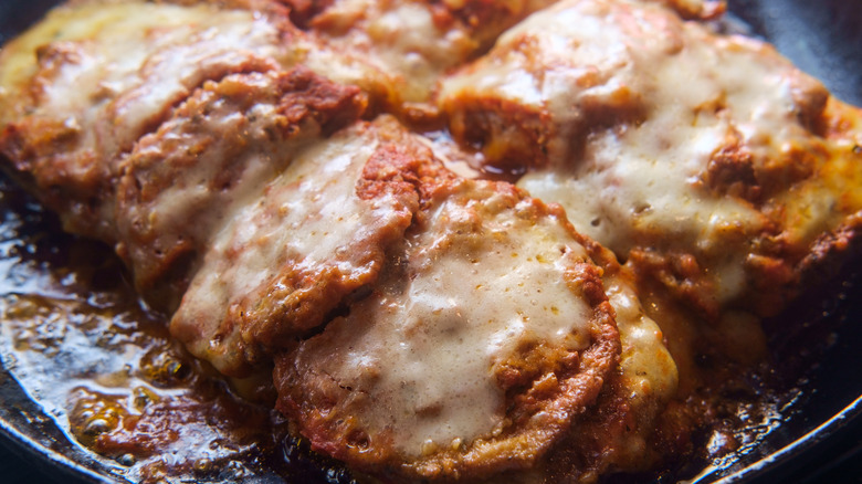 eggplant parm coooking in a pan