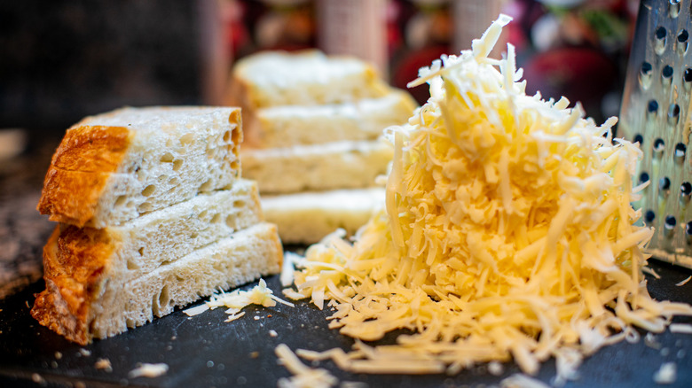sliced bread and shredded cheese
