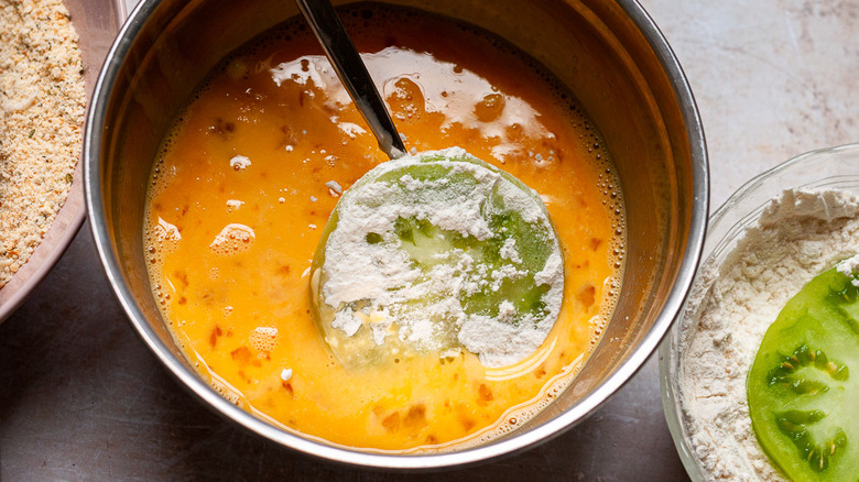 green tomato in a bowl 