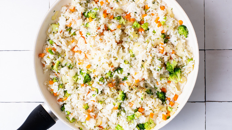 rice and vegetables in skillet