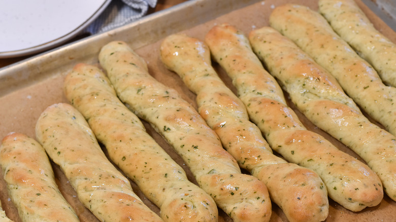 breadsticks baking until golden brown