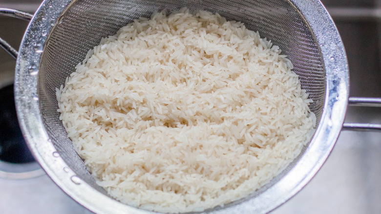 rice in mesh strainer