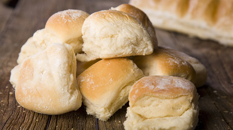 dinner rolls on a board