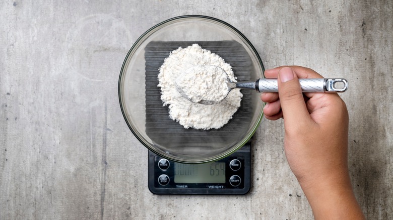 measuring flour on scale