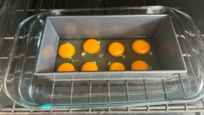 raw eggs in pan in oven