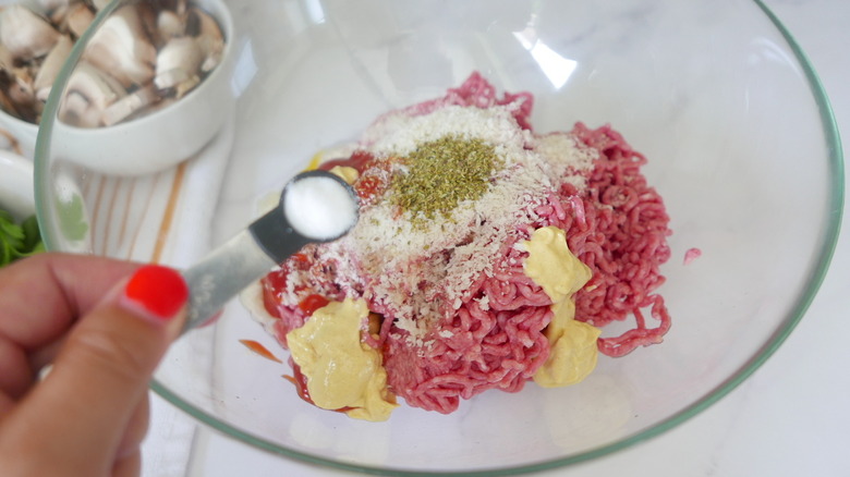 beef and seasonings in bowl