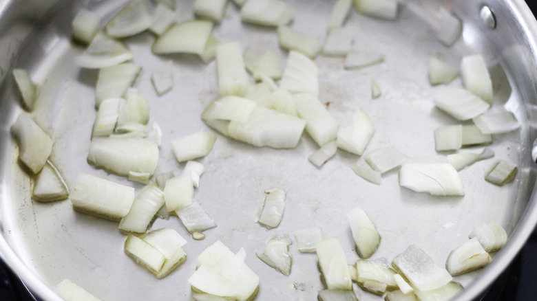 diced onions in pan