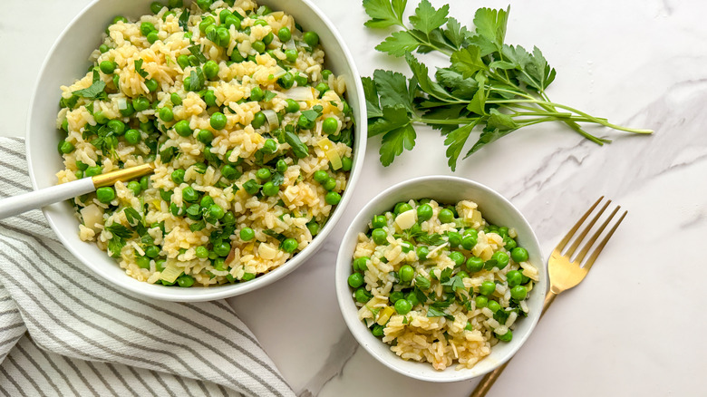 risi e bisi rice and peas in white bowl