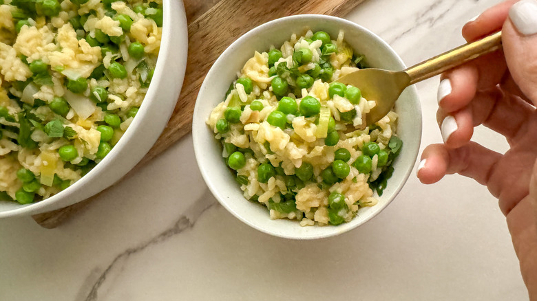 risi e bisi rice and peas in white bowl