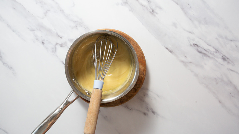 Whisking roux in saucepan