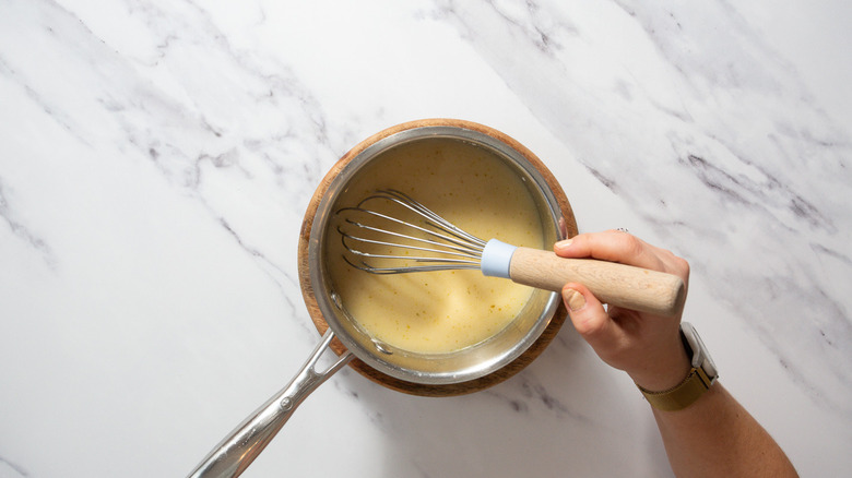 Whisking broths into gravy