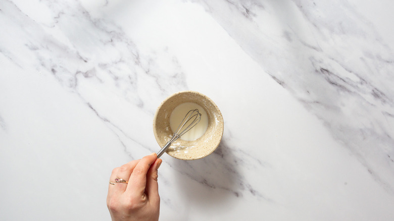 Whisking cornstarch and water