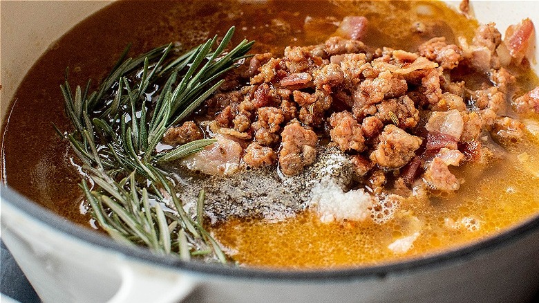 seasonings and meat in broth